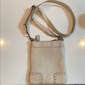 Coach cream pebble leather crossbody bag.